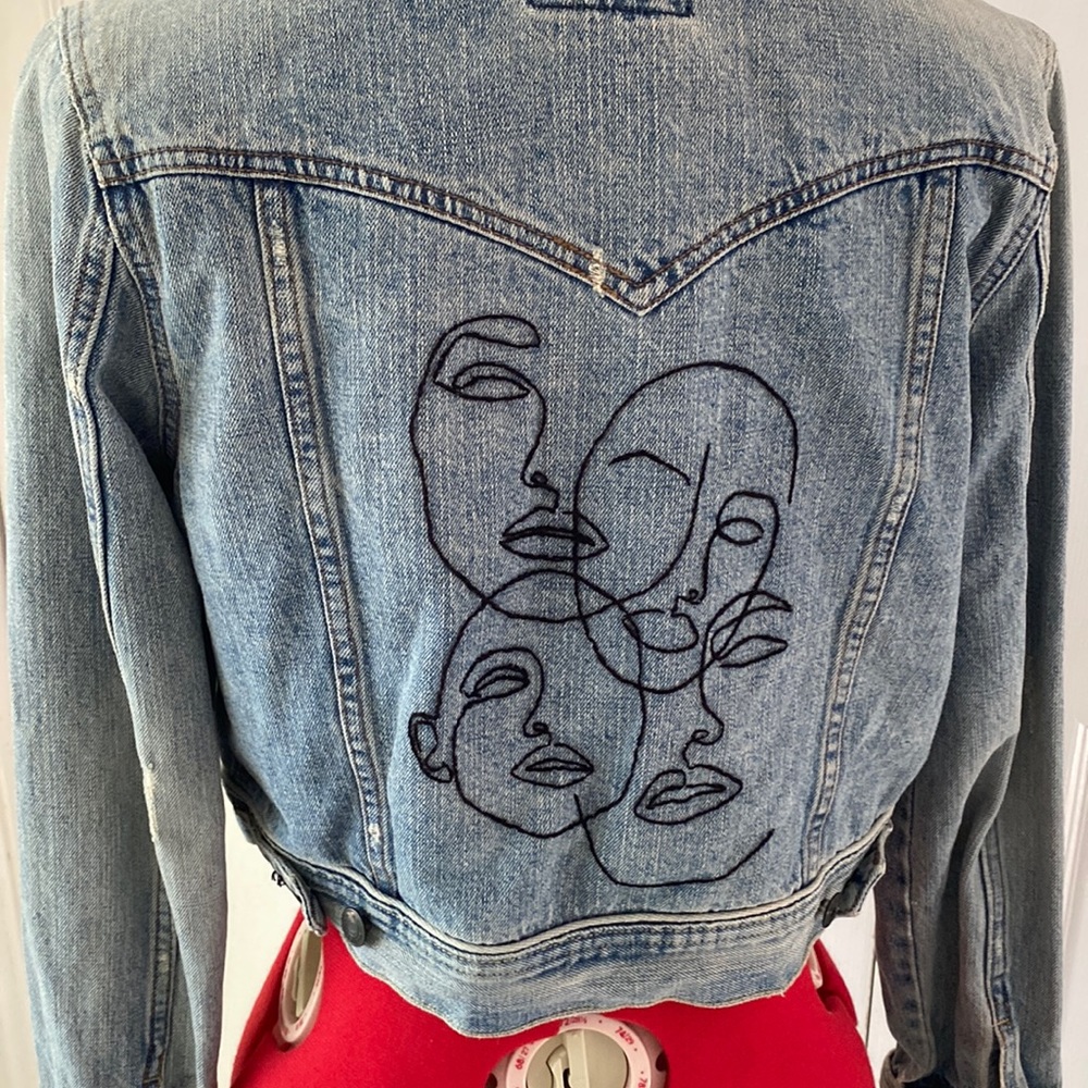 Distressed and embroidered jacket